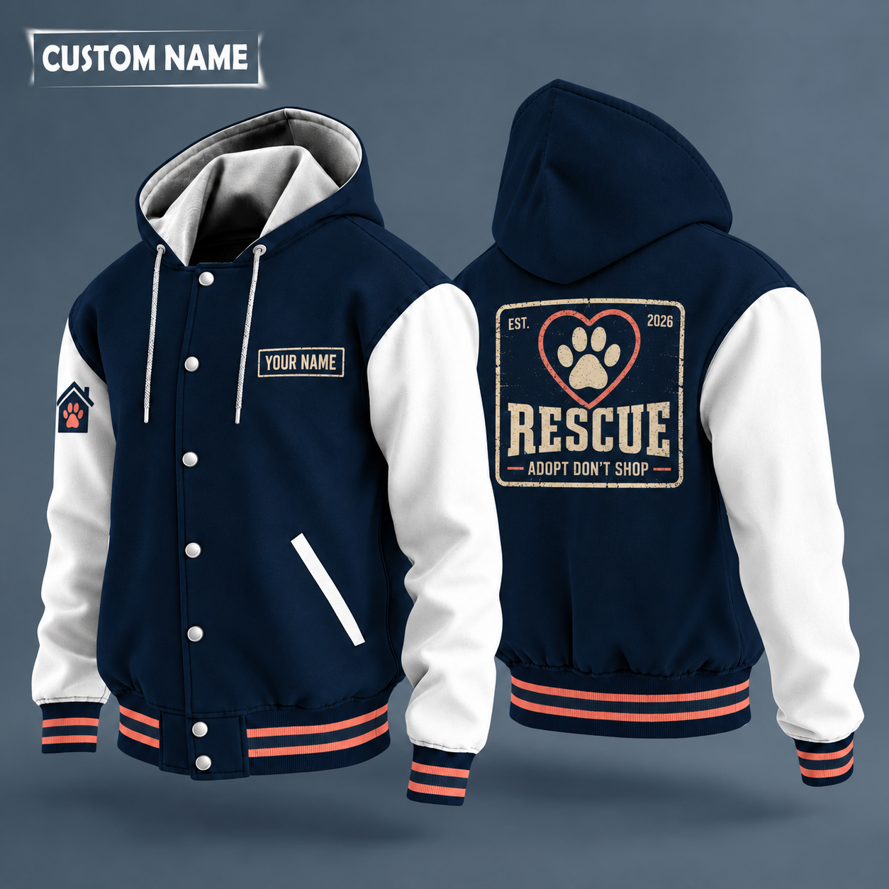 Hooded letterman jacket with white sleeves, paw print in a heart on the back, "RESCUE" lettering and a custom name on a work-shirt style name tag print on the chest