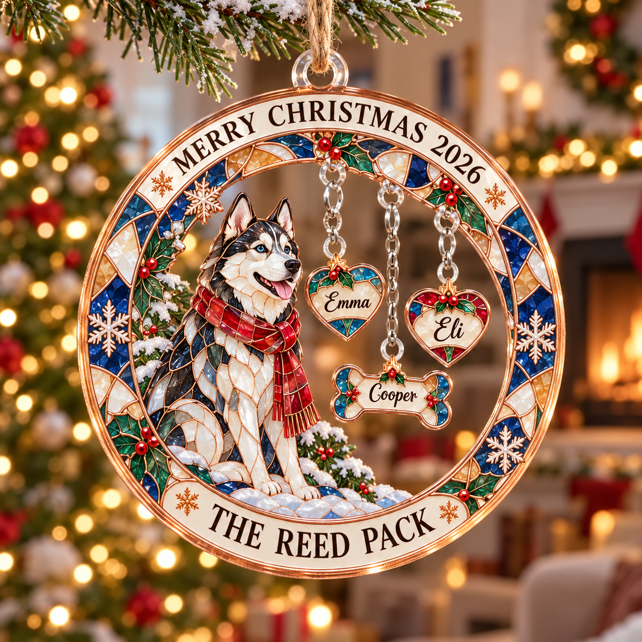 Stained-glass acrylic Christmas ornament with "THE REED PACK" and personalised name charms