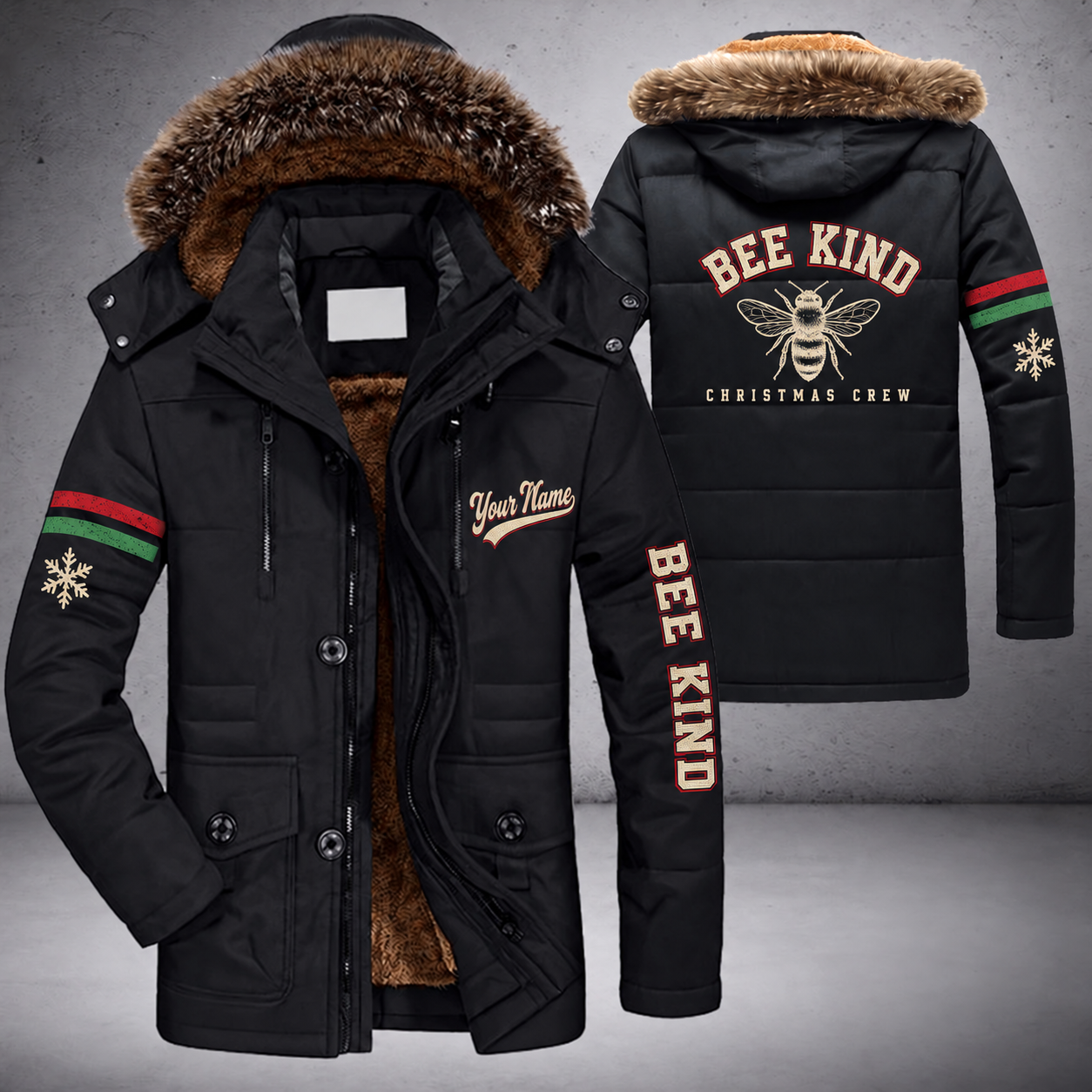 Black parka jacket with a faux-fur hood, snowflake and honeybee on the back, "BEE KIND" lettering and a custom name in script on the chest