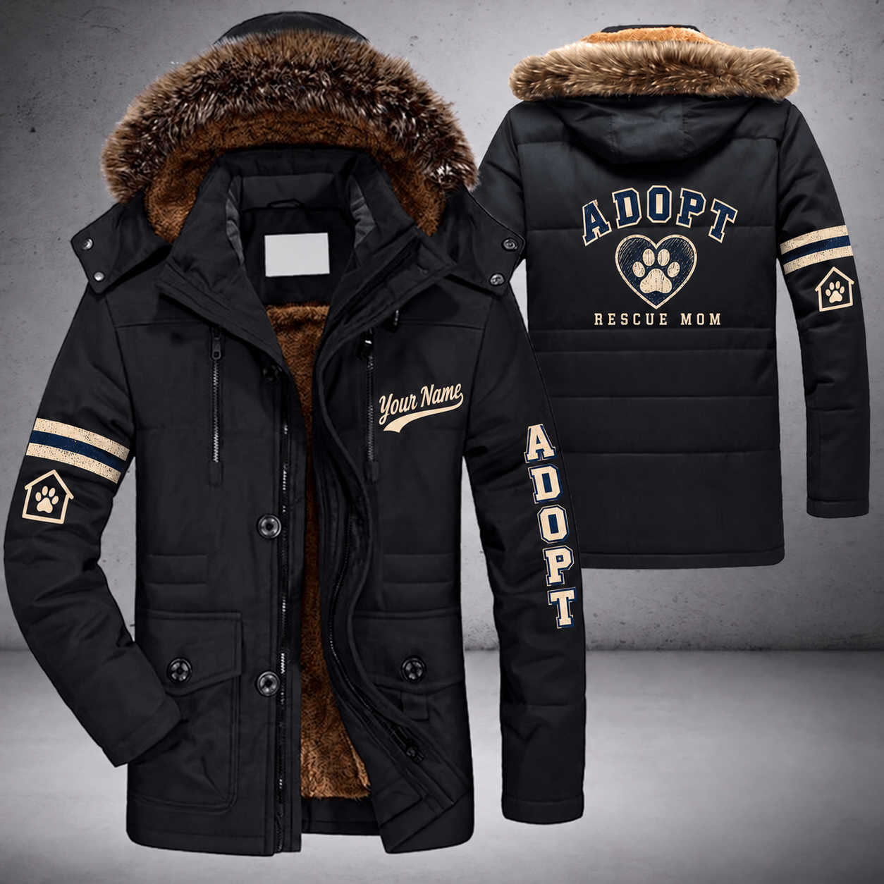 Black parka jacket with a faux-fur hood, paw print in a heart on the back, "ADOPT" lettering and a custom name in script on the chest