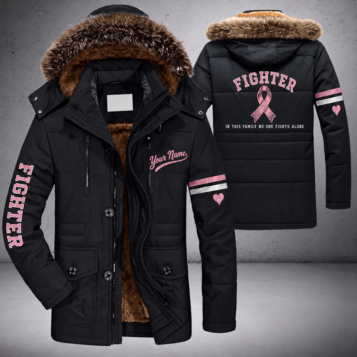 Black parka jacket with a faux-fur hood, pink ribbon on the back, "FIGHTER" lettering and a custom name in script on the chest