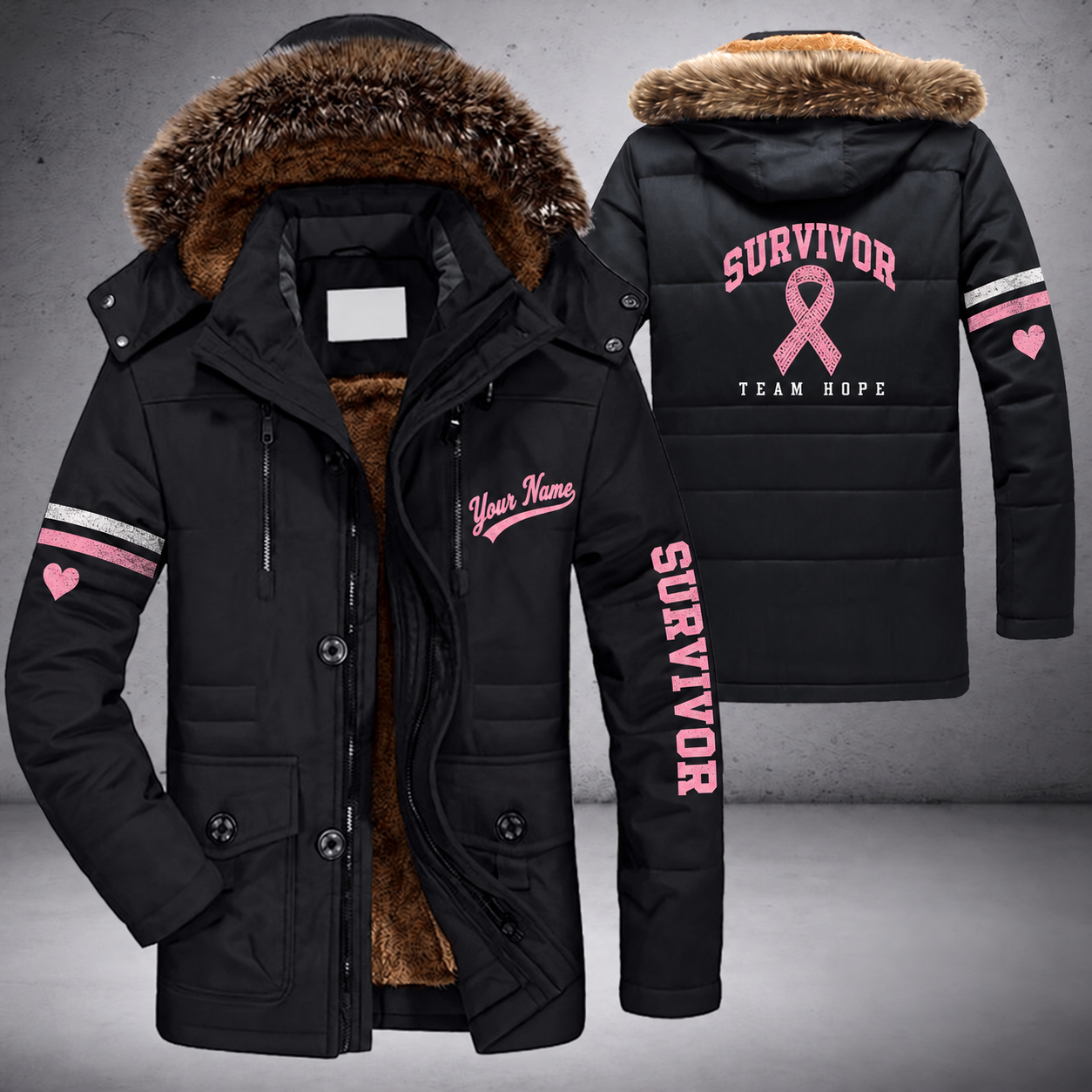 Black parka jacket with a faux-fur hood, pink ribbon on the back, "SURVIVOR" lettering and a custom name in script on the chest