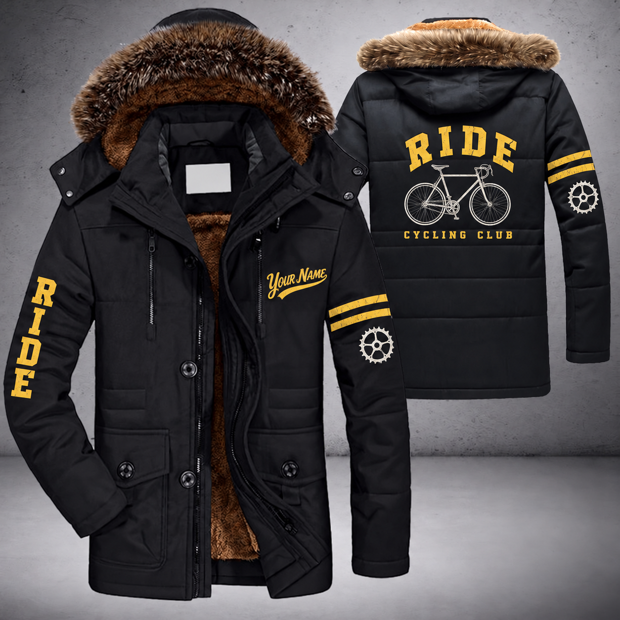 Black parka jacket with a faux-fur hood, road bike on the back, "RIDE" lettering and a custom name in script on the chest