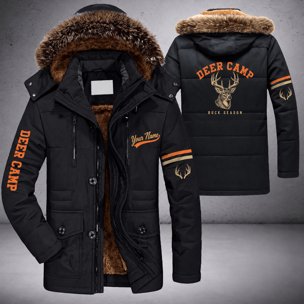 Black parka jacket with a faux-fur hood, whitetail buck head on the back, "DEER CAMP" lettering and a custom name in script on the chest
