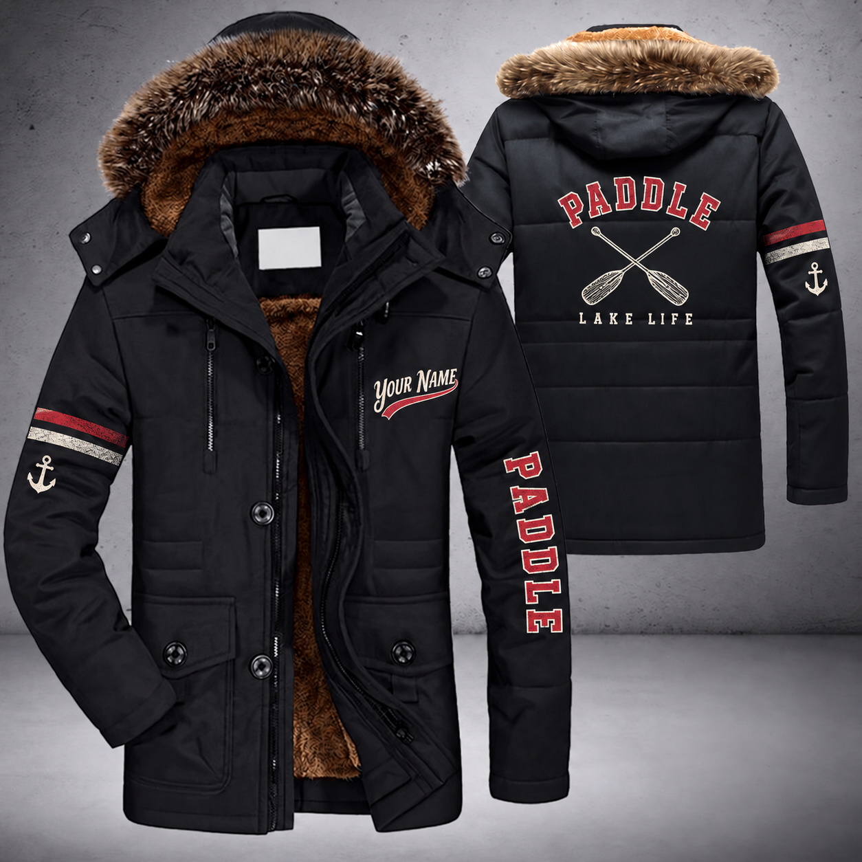 Black parka jacket with a faux-fur hood, crossed paddles on the back, "PADDLE" lettering and a custom name in script on the chest
