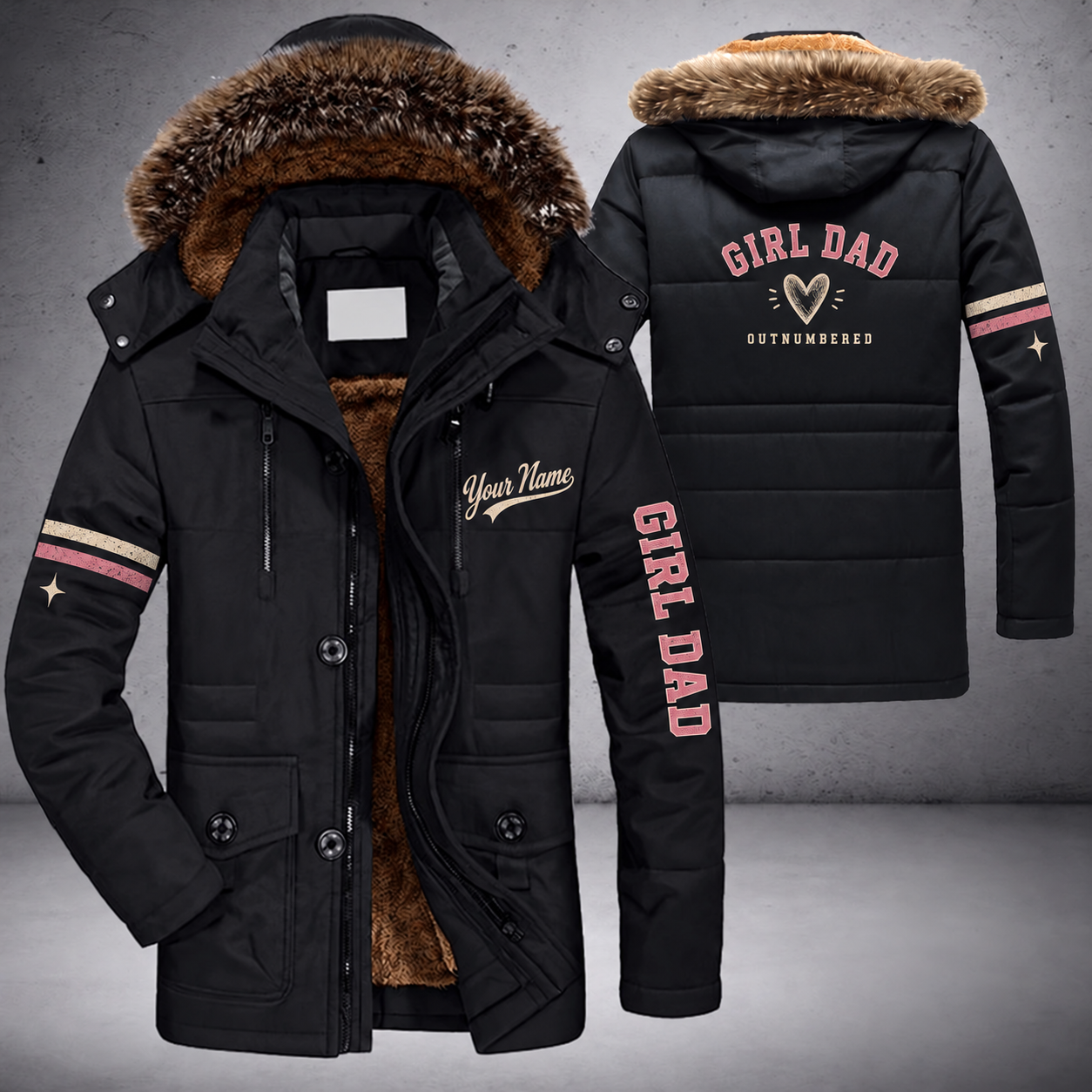 Black parka jacket with a faux-fur hood, heart on the back, "GIRL DAD" lettering and a custom name in script on the chest