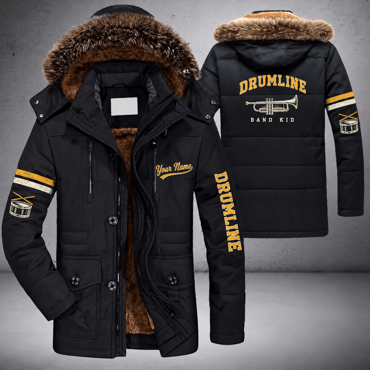 Black parka jacket with a faux-fur hood, trumpet on the back, "DRUMLINE" lettering and a custom name in script on the chest