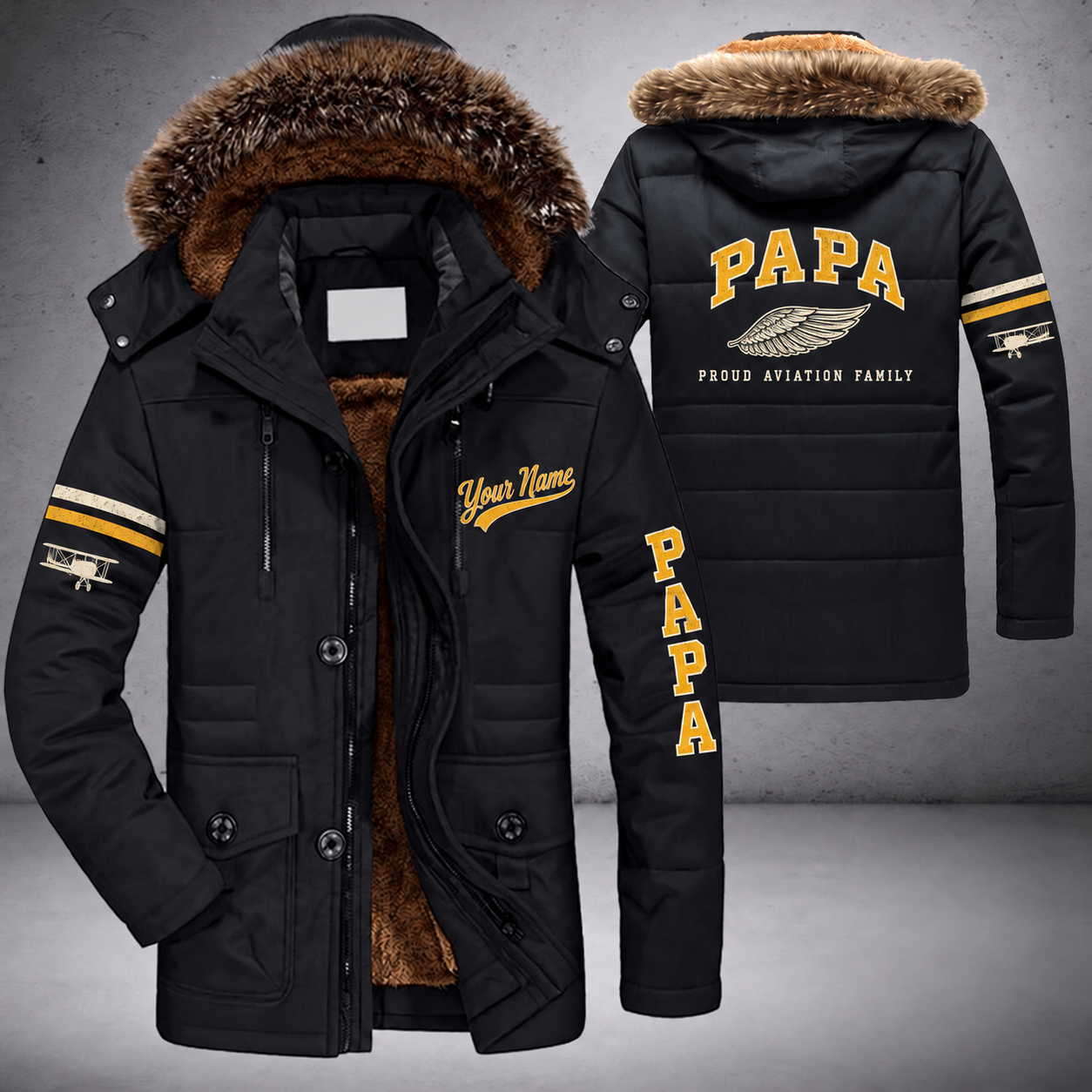 Black parka jacket with a faux-fur hood, single feather-shaped wing pin (not a military insignia) on the back, "PAPA" lettering and a custom name in script on the chest