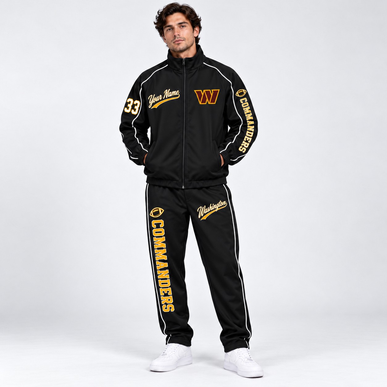 Model wearing the Washington Commanders tracksuit set in black
