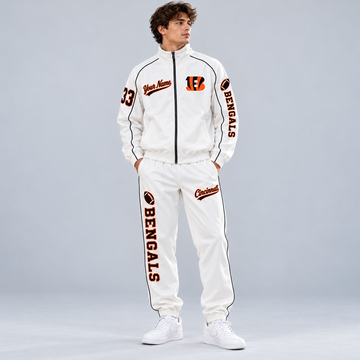 Model wearing the Cincinnati Bengals tracksuit set in white