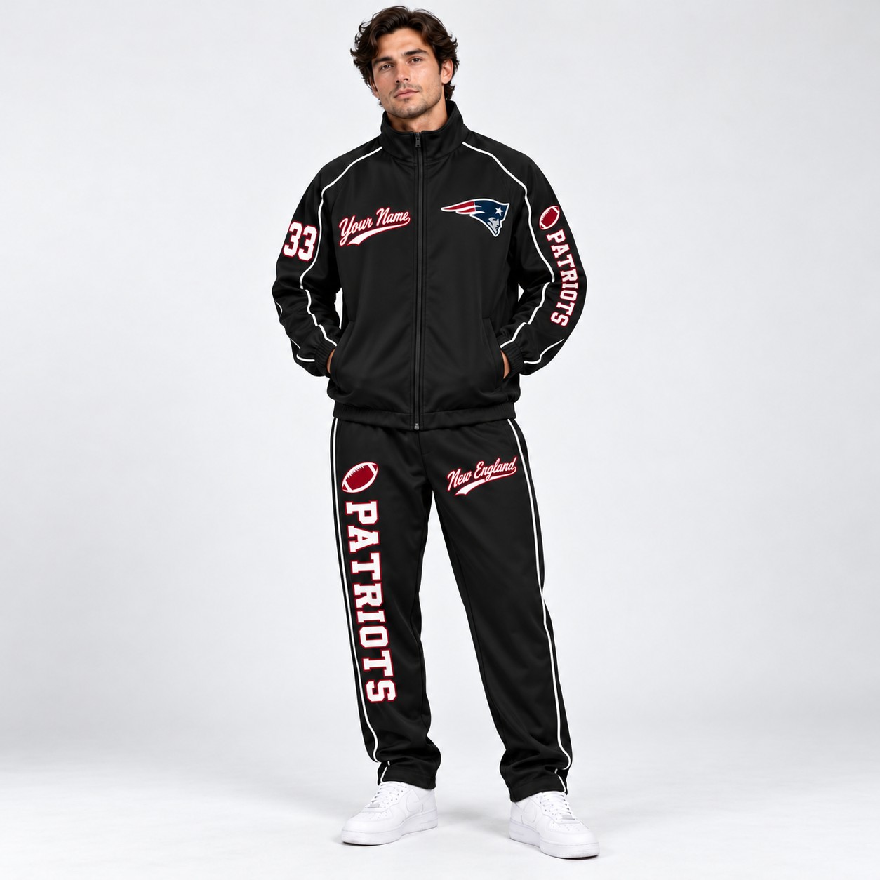 Model wearing the New England Patriots tracksuit set in black
