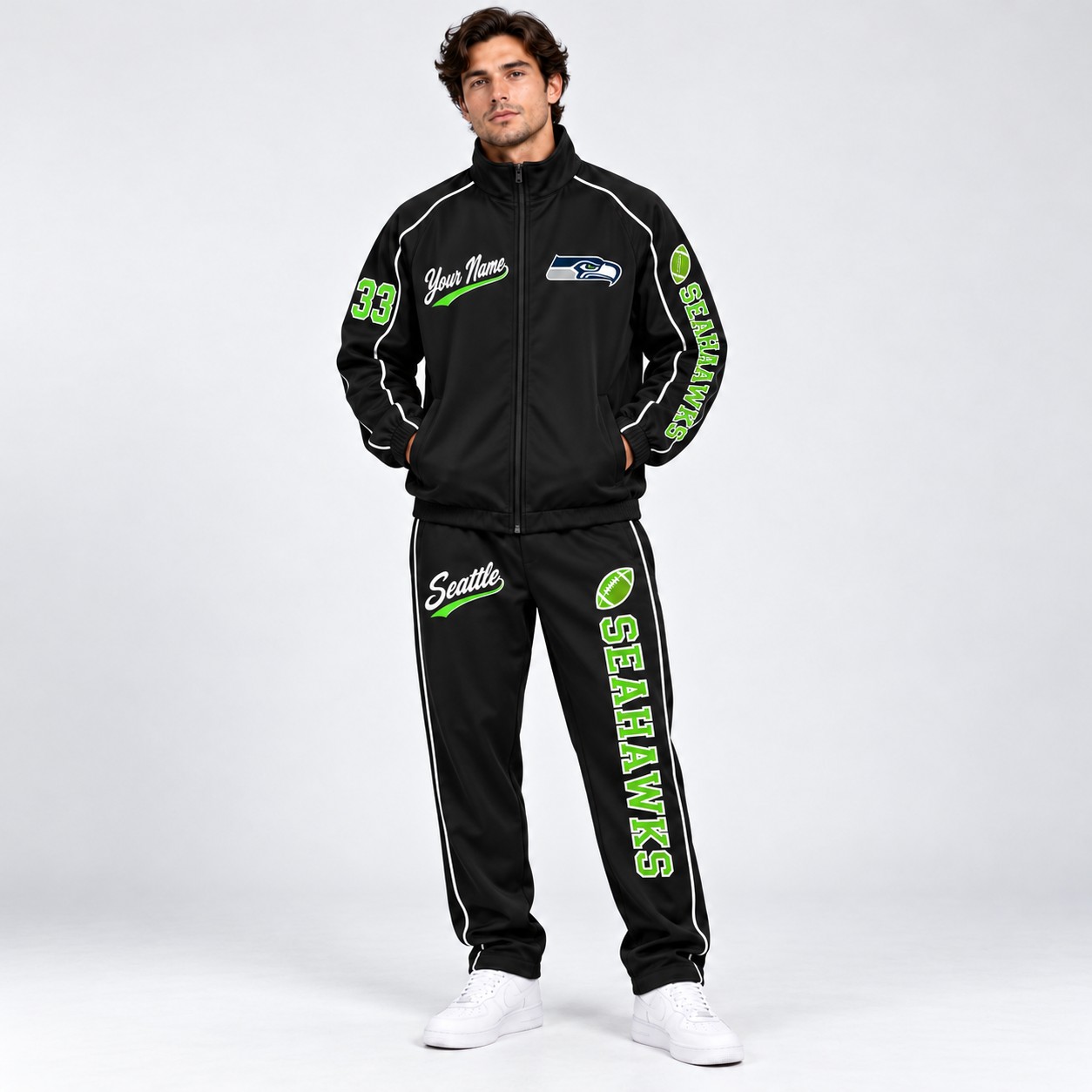 Model wearing the Seattle Seahawks tracksuit set in black