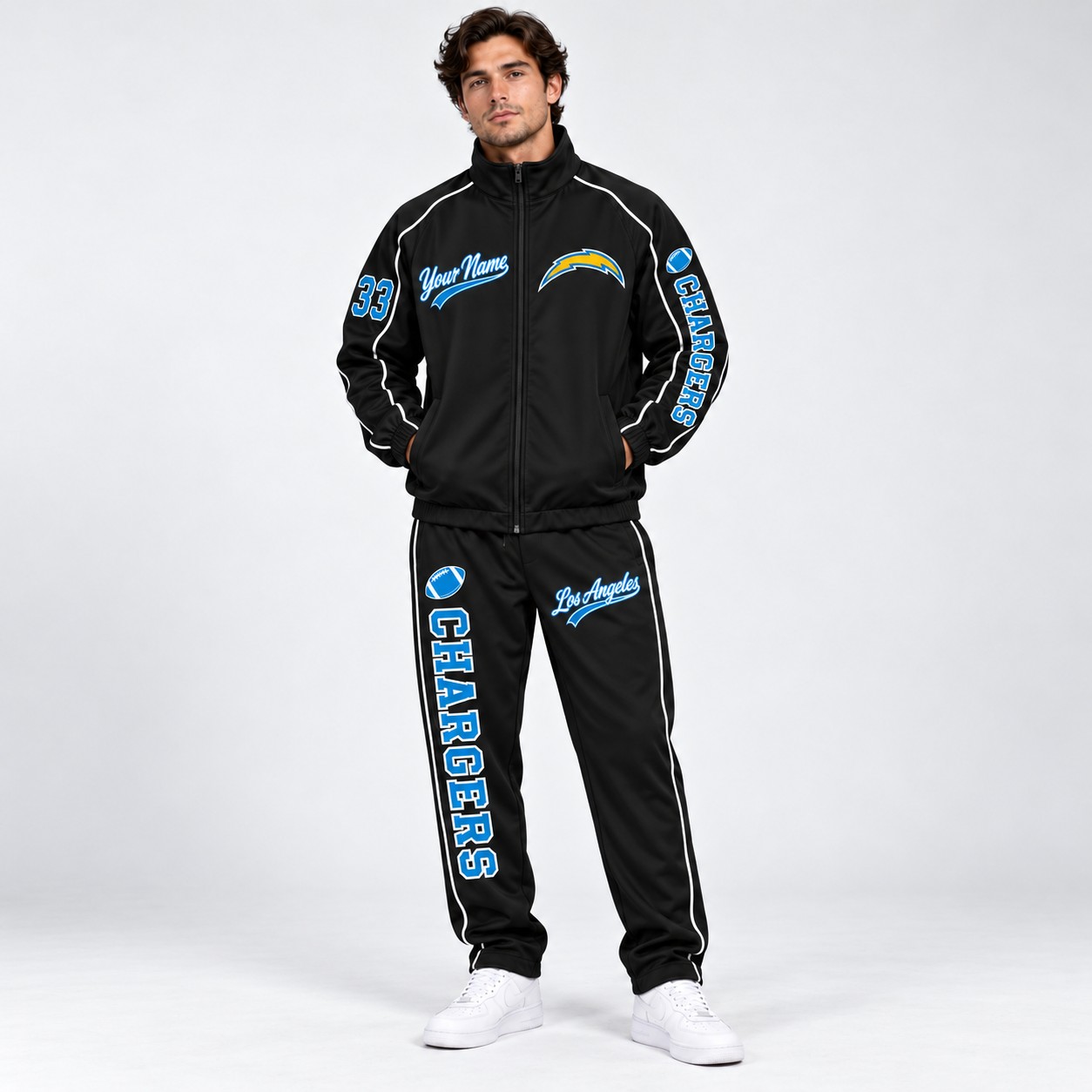 Model wearing the Los Angeles Chargers tracksuit set in black