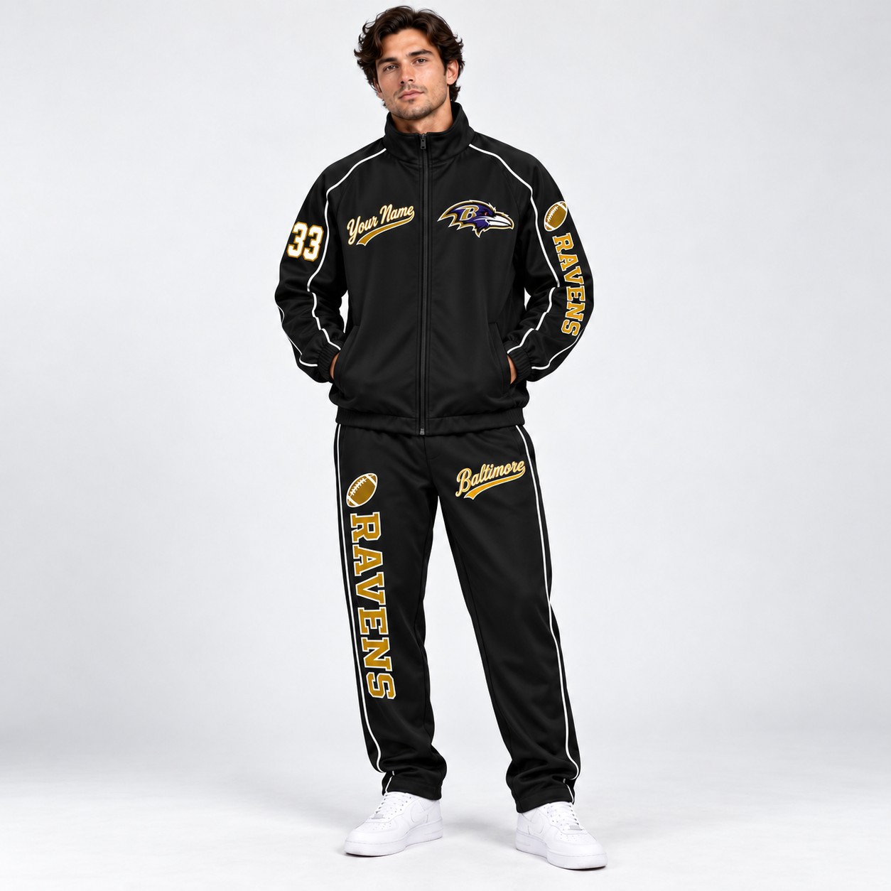Model wearing the Baltimore Ravens tracksuit set in black