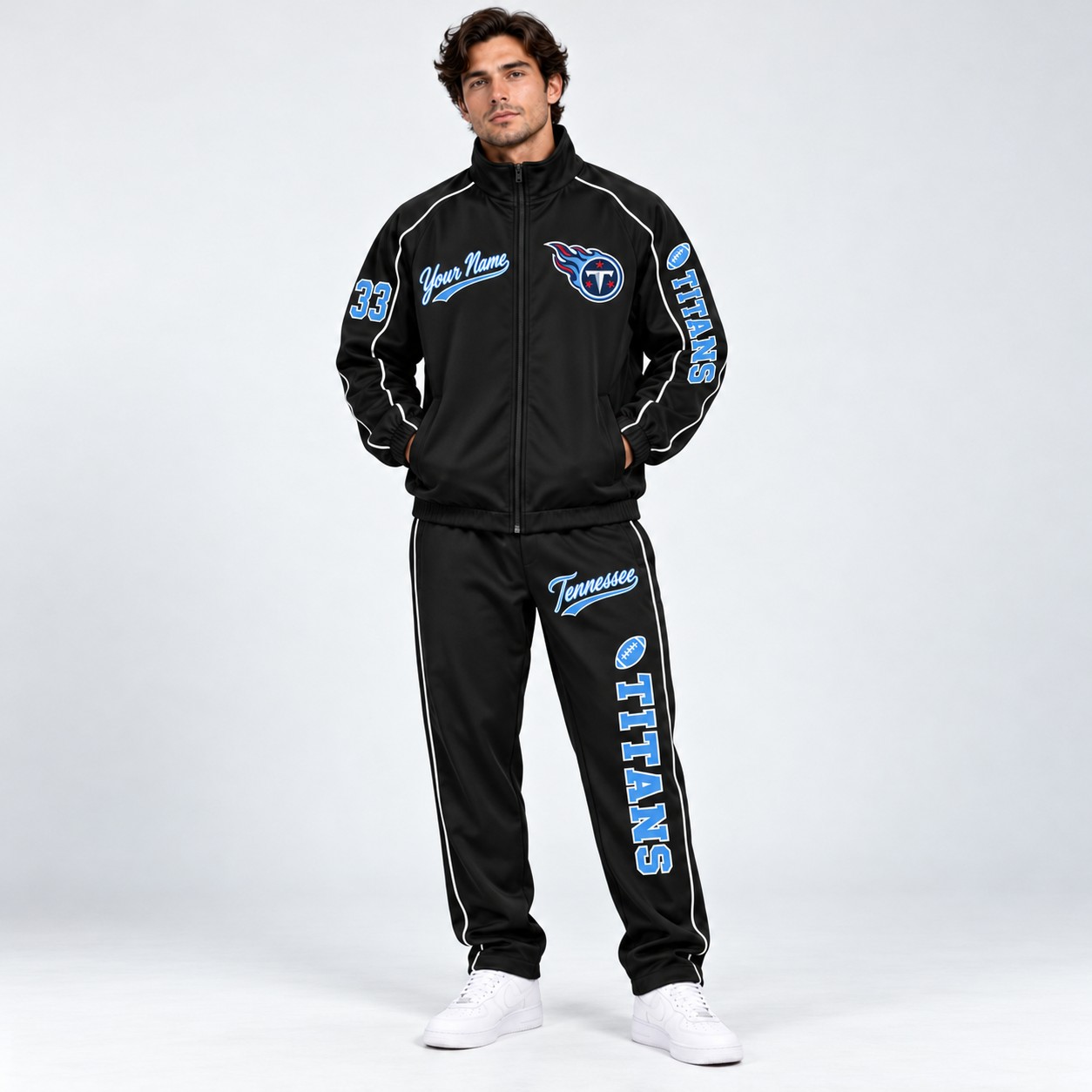 Model wearing the Tennessee Titans tracksuit set in black