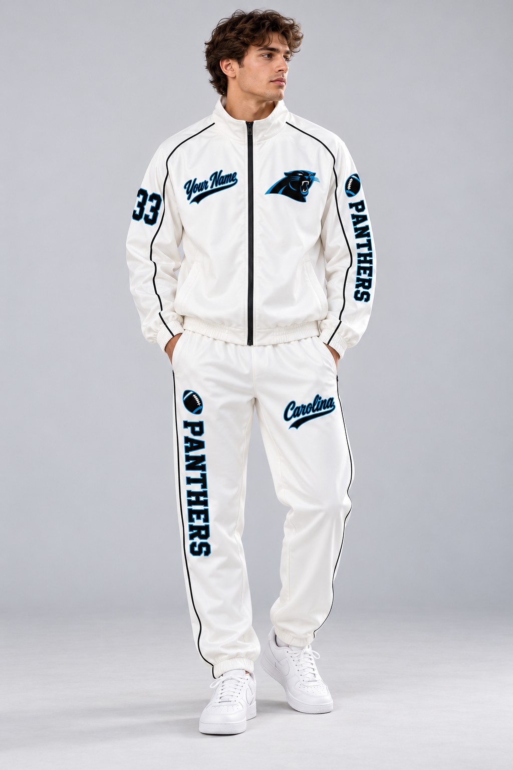 Model wearing the Carolina Panthers tracksuit set in white