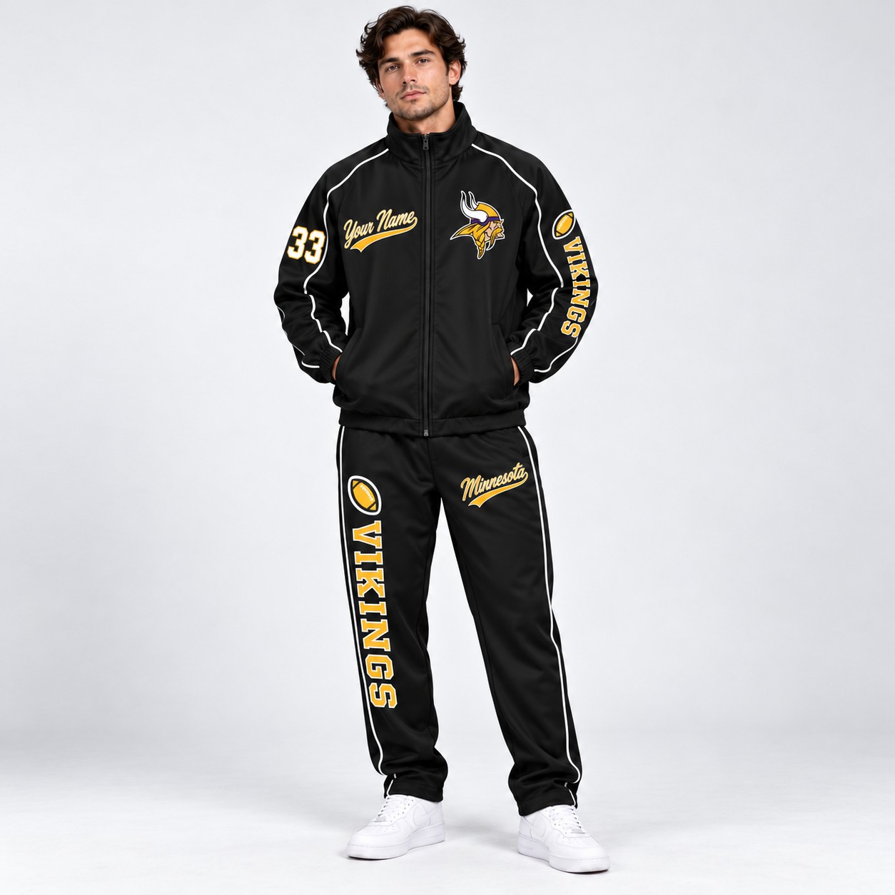 Model wearing the Minnesota Vikings tracksuit set in black