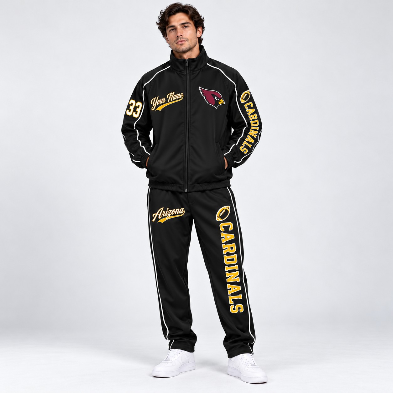 Model wearing the Arizona Cardinals tracksuit set in black