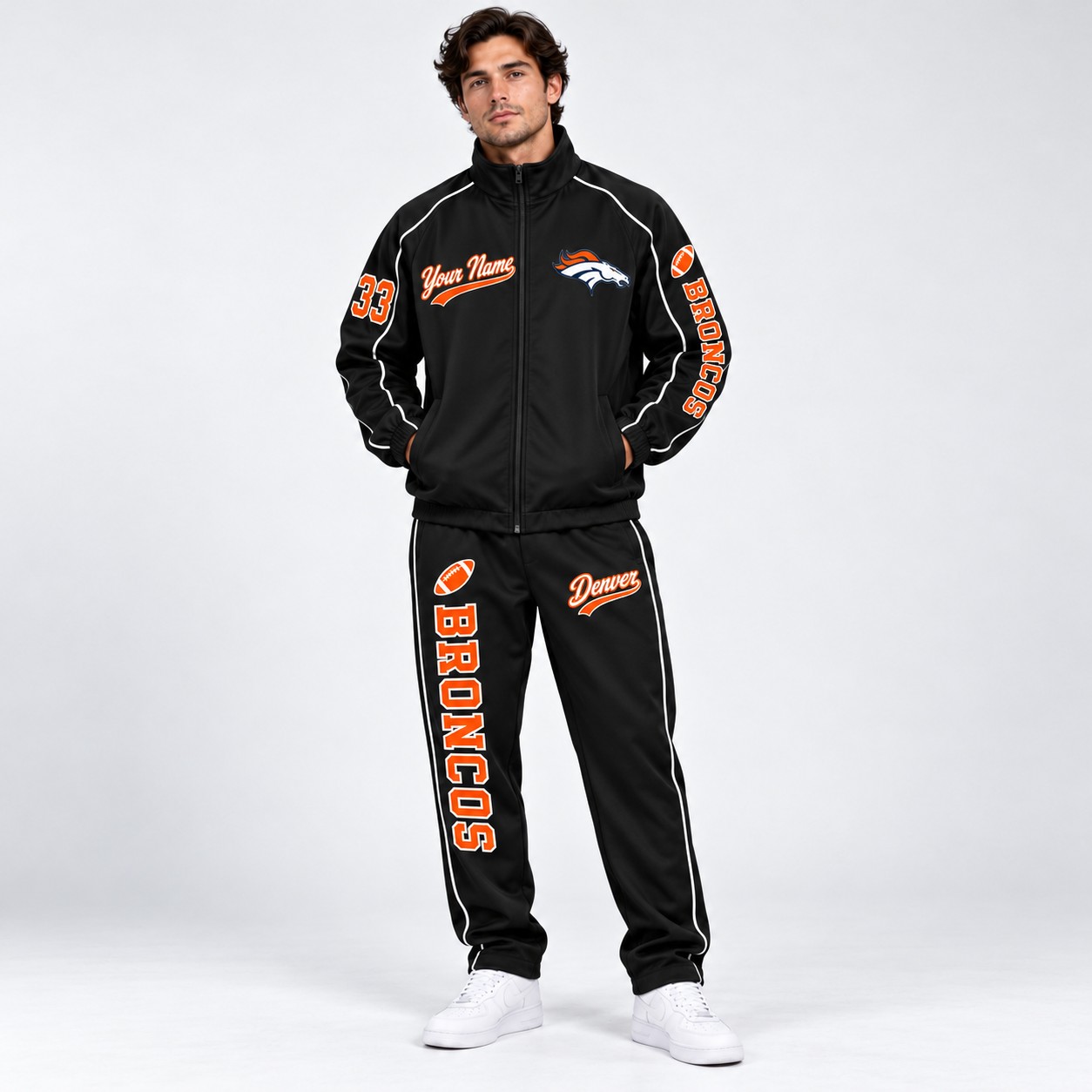 Model wearing the Denver Broncos tracksuit set in black