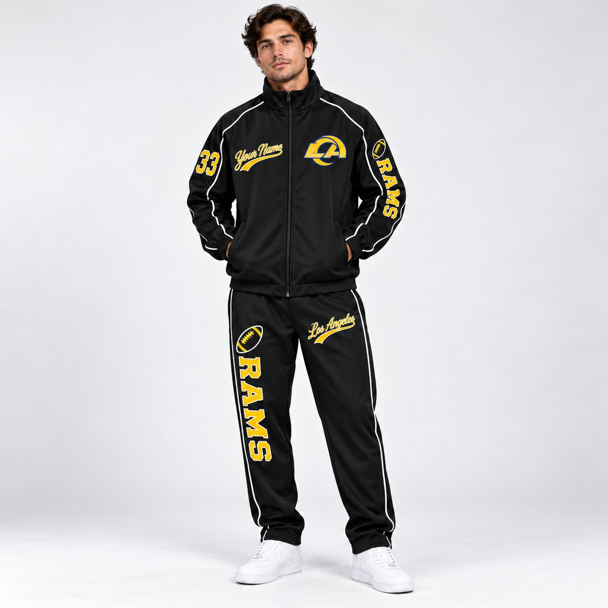 Model wearing the Los Angeles Rams tracksuit set in black
