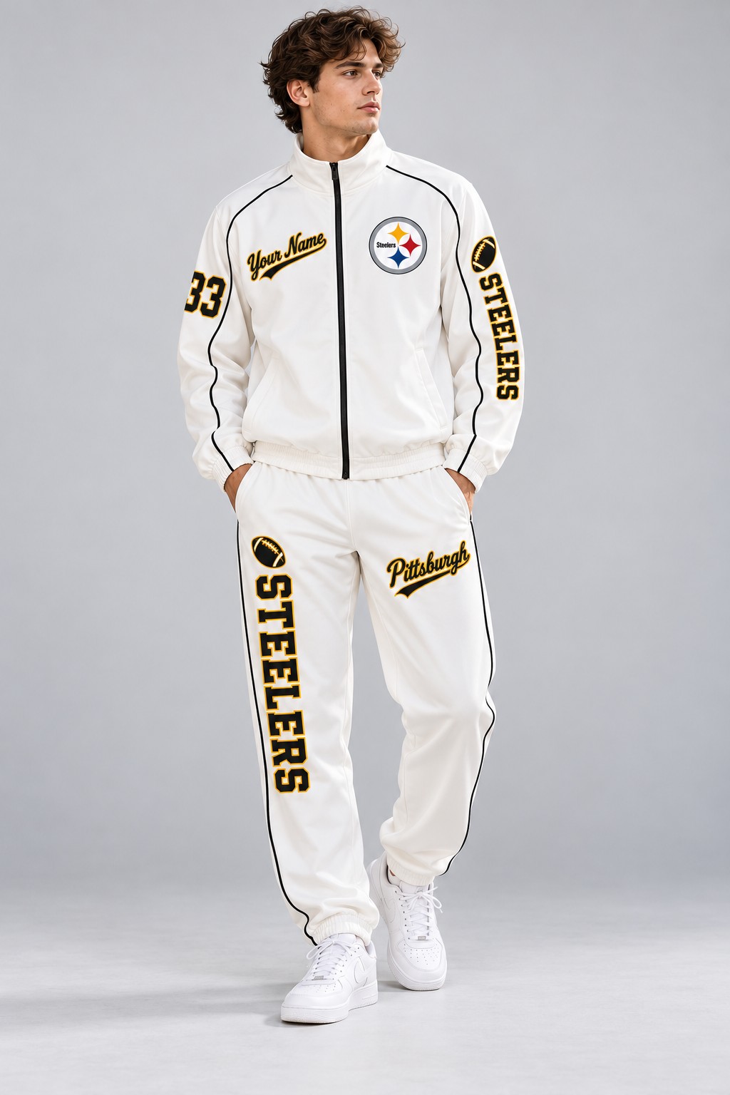 Model wearing the Pittsburgh Steelers tracksuit set in white